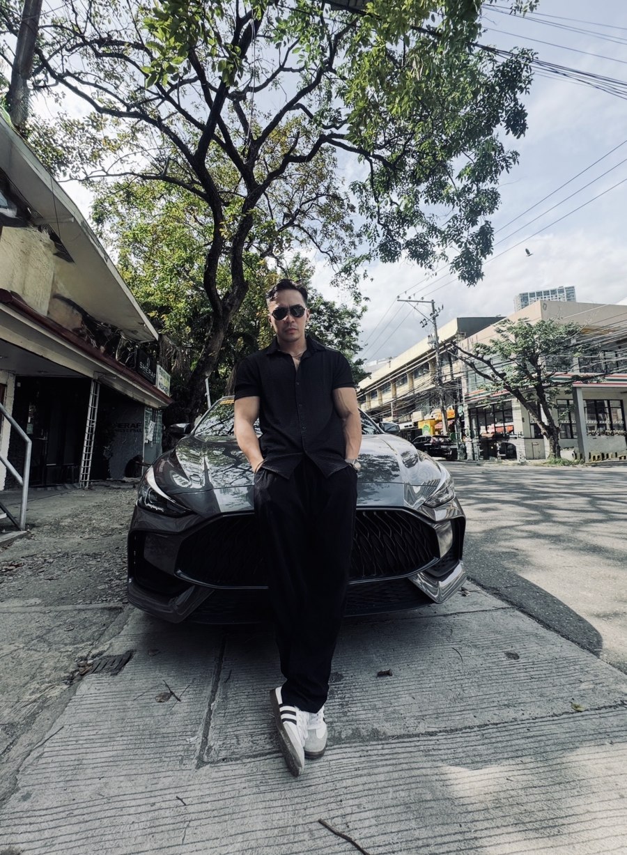 Charlie Leicester with his car